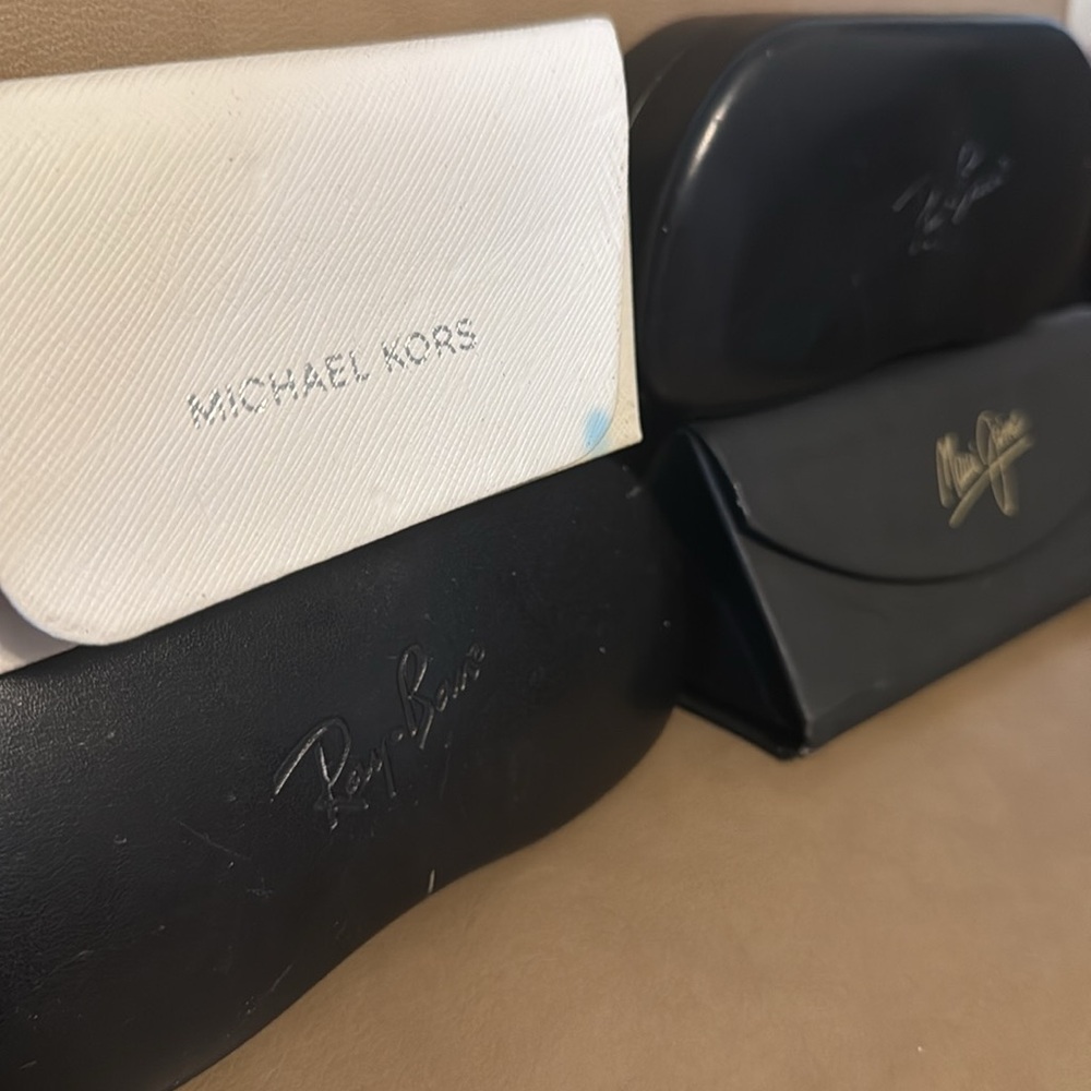 5 sunglass cases, Ray-Ban x2 Michael Kors and Maui Jim x2
